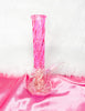 Side profile of pink iridescent swirl bong