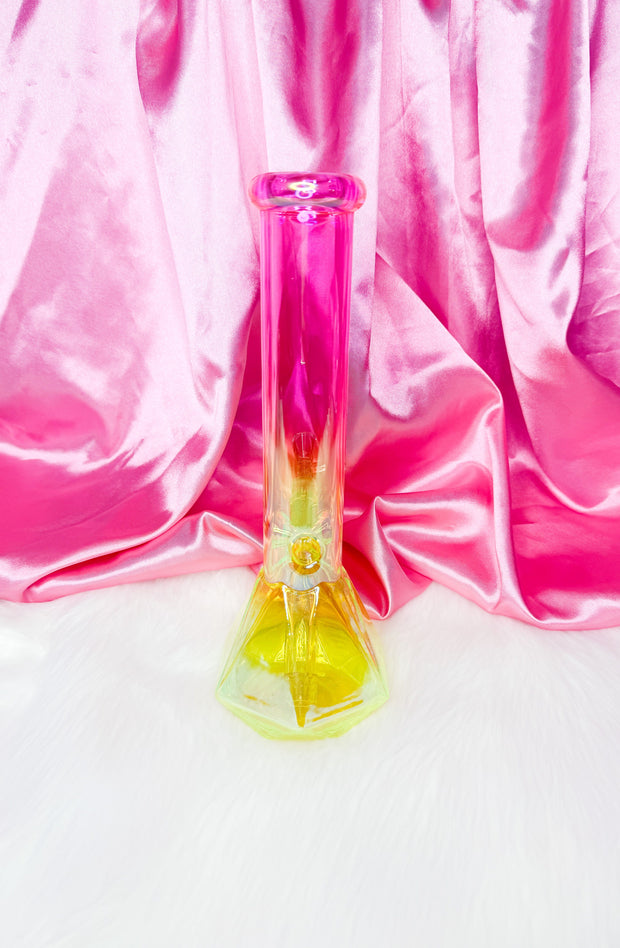 Back view of the neon pink and yellow bong with a diamond base