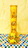 Backside of the amber beehive bong on a honeycomb background
