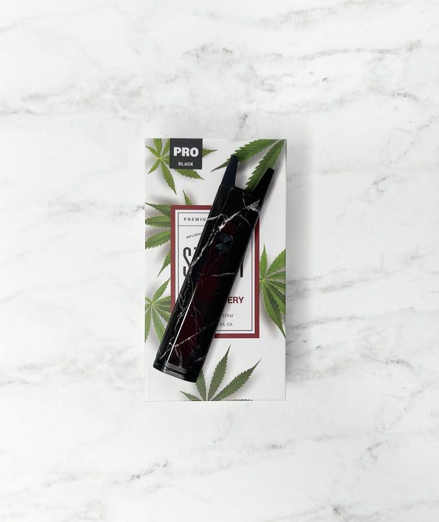 black and grey marble stiiizy pro battery on white background