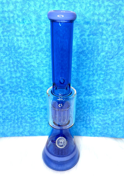 Blue 18 inch double perc glass water pipe on a blue textured background