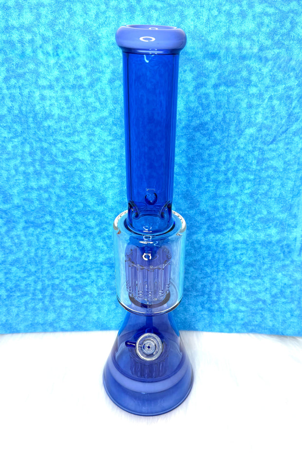 Blue 18 inch double perc glass water pipe on a blue textured background
