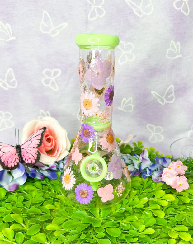 Front side of the green dried floral bong with pink and purple flowers super cute and girly.
