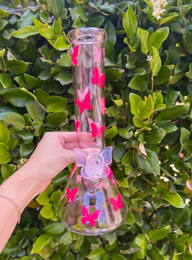 Pink 12" pink butterfly bong on green background