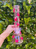 Pink 12" pink butterfly bong on green background