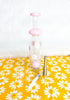 Pink nectar collector with white daisies and metal tip