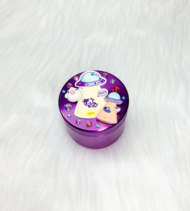 Purple alien abduction custom weed grinder on white background