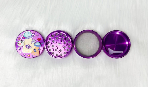 Purple alien abduction weed grinder open showing all compartments