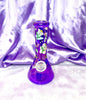 Purple iridescent water pipe with daisy print on the neck
