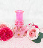 Side profile of the mini iridescent pink dried floral bong