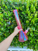 Side profile of our goregous pink 16 inch neon bong in natural lighting
