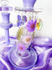 Side shot of the real dried pressed flowers used to make the milky purple bong