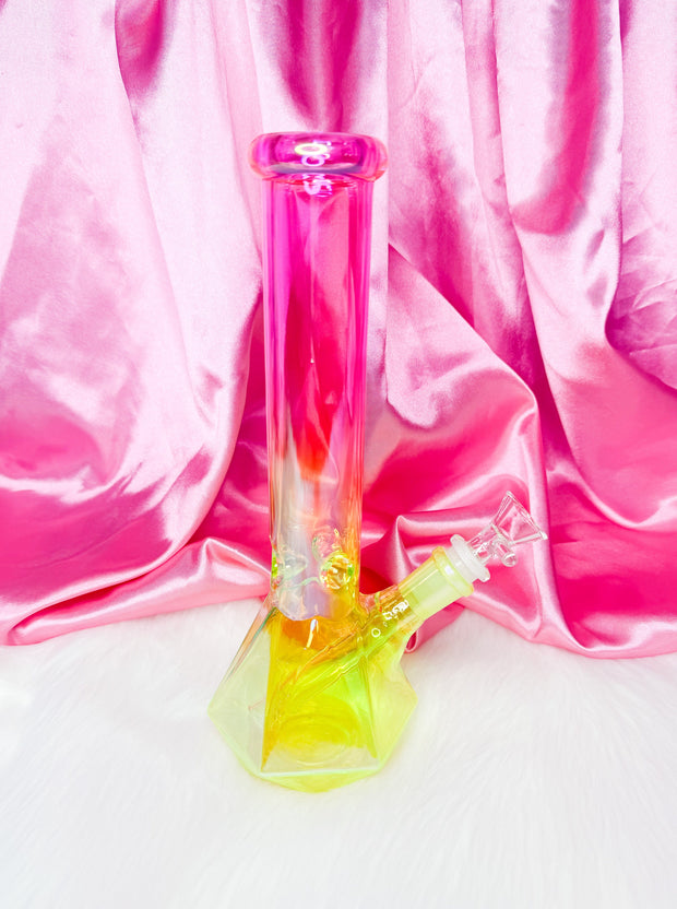 Side view of the neon pink and yellow diamond beaker bong