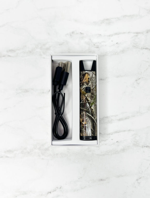 Stiiizy Pro Camo Battery with USB-C charger in box on white background