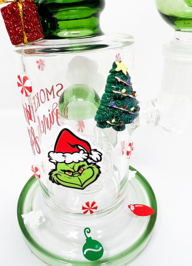 closeup of Grinch water hand pipe