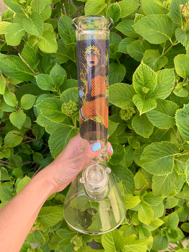 A person holding an anime bong outside