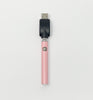 Baby pink glitter vape pen with white background