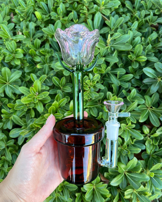 Pink rose dab rig with brown pot base featuring pink bowl