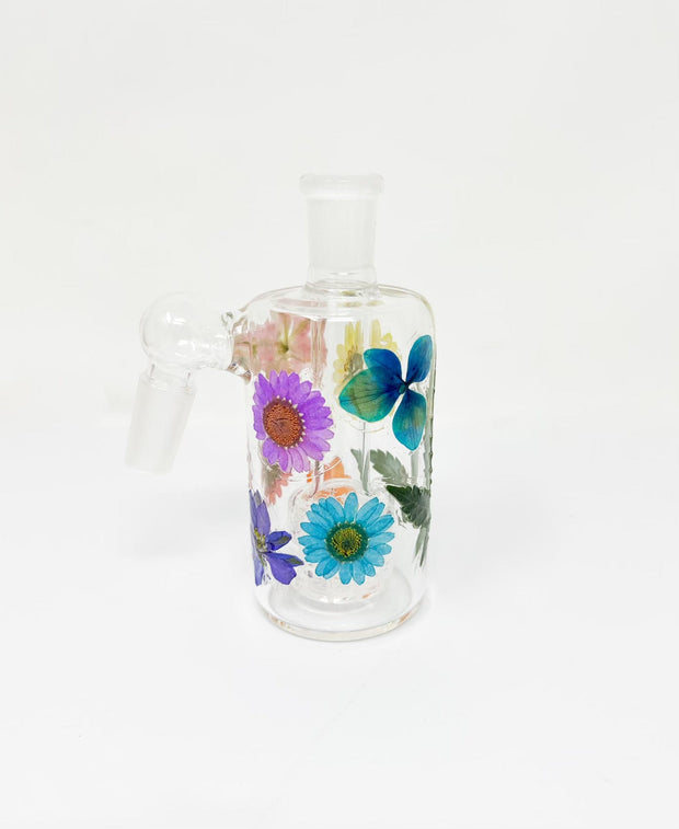 A rainbow dried floral 45 degree ash catcher for bongs on white background