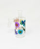 A rainbow dried floral 45 degree ash catcher for bongs on white background