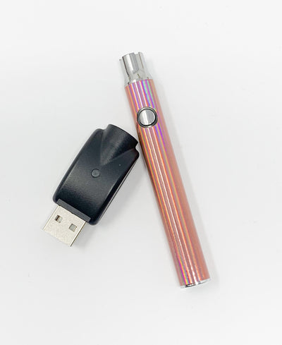 Rose gold 510 threaded battery on white background.