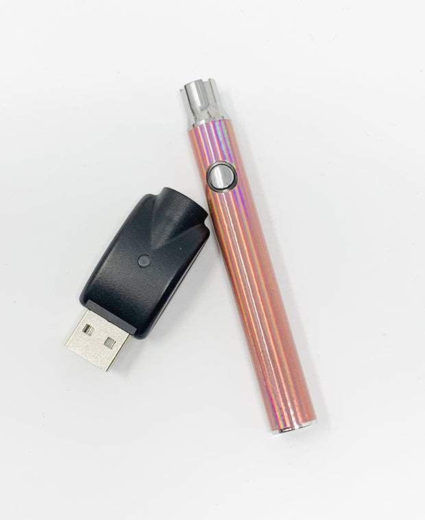 Rose gold 510 threaded battery on white background.